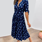 Caterina – Robe midi à pois col V effet sculptant