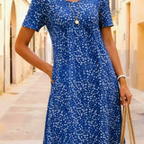 Colette – Robe midi fluide et confortable à imprimé discret