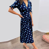 Caterina – Robe midi à pois col V effet sculptant
