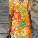 Nira – Robe midi fluide fleurie et élégante