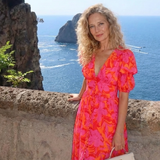 Jade | Robe midi fleurie à col V et manches bouffantes