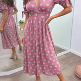 Caterina – Robe midi à pois col V effet sculptant