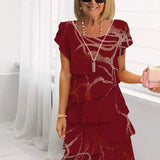 Lucie – Robe élégance fluide à volants