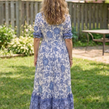 Clara – Robe midi fluide fleurie