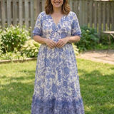 Clara – Robe midi fluide fleurie