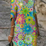 Nira – Robe midi fluide fleurie et élégante
