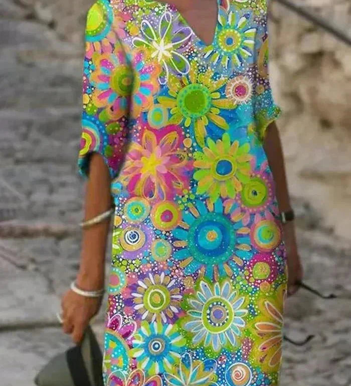 Nira – Robe midi fluide fleurie et élégante
