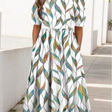 Carline – Robe midi fleurie