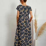 Henrielle – Robe midi fleurie élégante