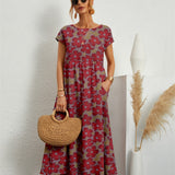 Henrielle – Robe midi fleurie élégante