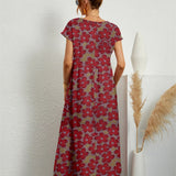 Henrielle – Robe midi fleurie élégante
