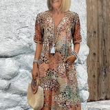 Véronique – Robe midi fluide élégante