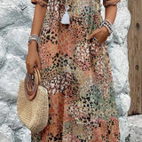 Véronique – Robe midi fluide élégante