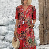 Véronique – Robe midi fluide élégante
