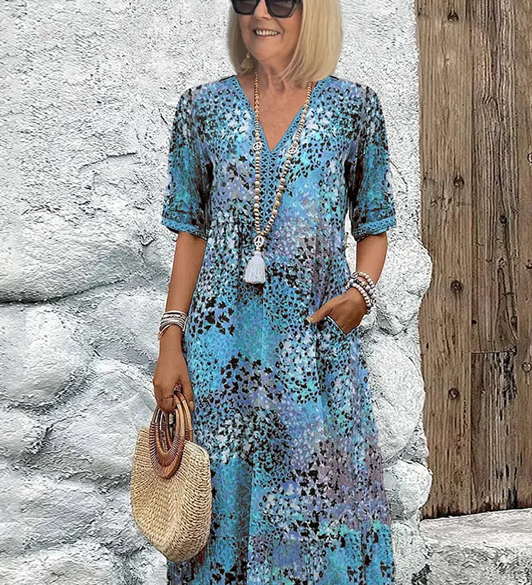Véronique – Robe midi fluide élégante