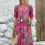 Véronique – Robe midi fluide élégante