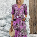 Véronique – Robe midi fluide élégante